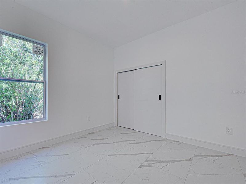 Spacious, unfurnished interior of a new home in , Rotonda West (Image 33).