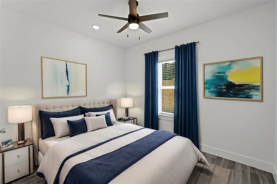 Virtually Staged: Secondary Bedroom with new vinyl floors, recessed lighting, and a ceiling fan. It is complete with a built-in closet.