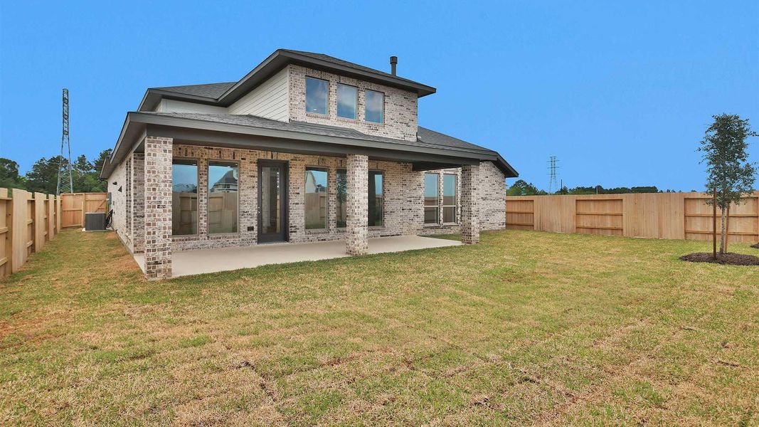 Exterior details and patio area of a home in Legacy Prairie at Katy Court, Katy (Image 3).