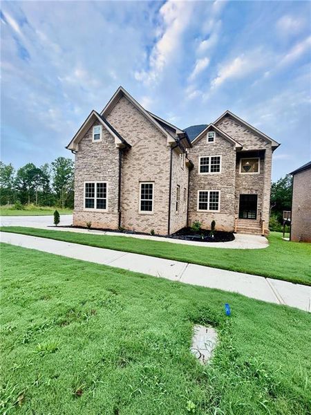 Front exterior of a new home in , Atlanta, GA, highlighting curb appeal (Image 1). Front exterior of a new home in , Atlanta, GA, highlighting curb appeal (Image 1).