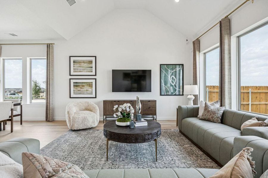 Living Room in the Trinity home plan by Trophy Signature Homes – REPRESENTATIVE PHOTO Living Room in the Trinity home plan by Trophy Signature Homes – REPRESENTATIVE PHOTO