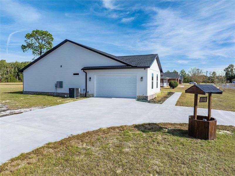 Front exterior of a new home in , Lake City, FL, highlighting curb appeal (Image 28).