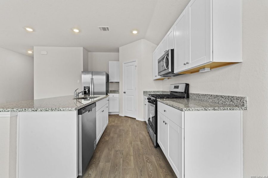 Furnished interior view inside a new home in Navarro Fields, Seguin (Image 6).