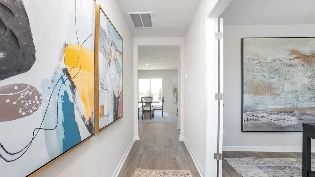 Representative furnished interior of a home built from the Penwell by D.R. Horton in Foxtail, Yadkinville (Image 4).