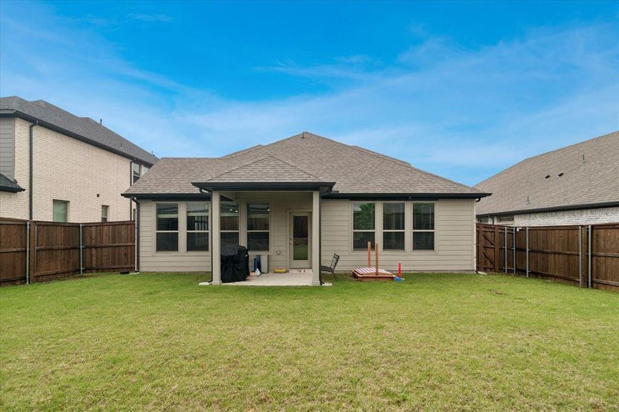 Exterior details and patio area of a home in Devonshire, Forney (Image 20).