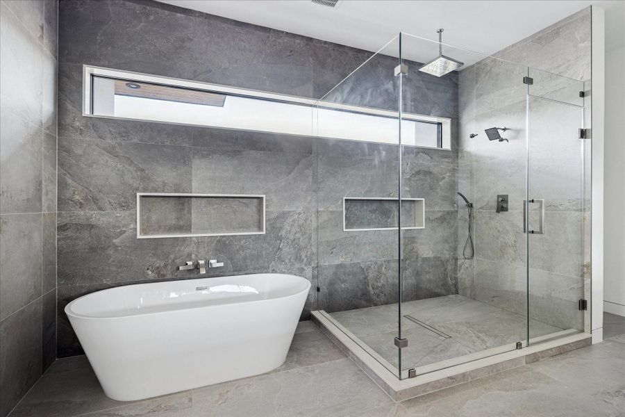 Spa-like bathroom shower and soaking tub.