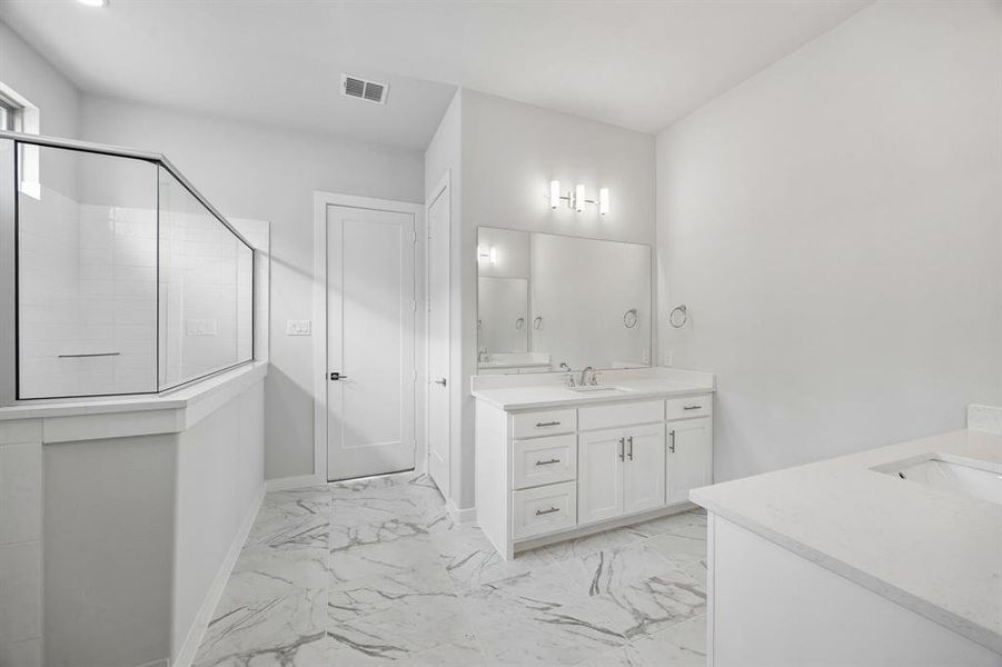 Primary Bathroom in the Picasso II home plan by Trophy Signature Homes – REPRESENTATIVE PHOTO Primary Bathroom in the Picasso II home plan by Trophy Signature Homes – REPRESENTATIVE PHOTO