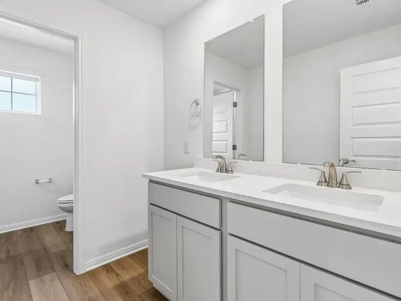 Furnished interior view inside a new home in Colony at Cole Springs - Boulevard Collection, Buda (Image 8).