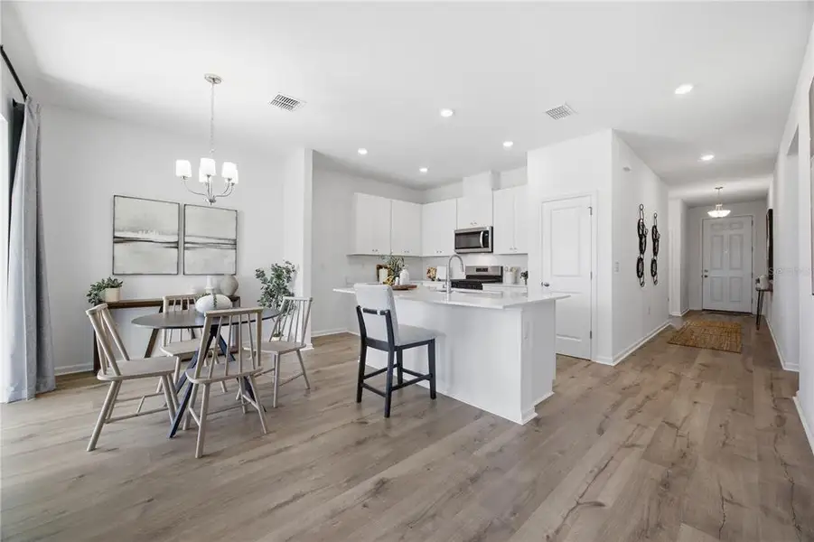 Furnished interior view inside a new home in , Okahumpka (Image 8).