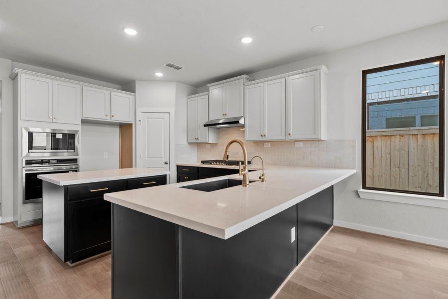 Furnished interior view inside a new home in Bridgeland 45', 50', 70', Cypress (Image 13).