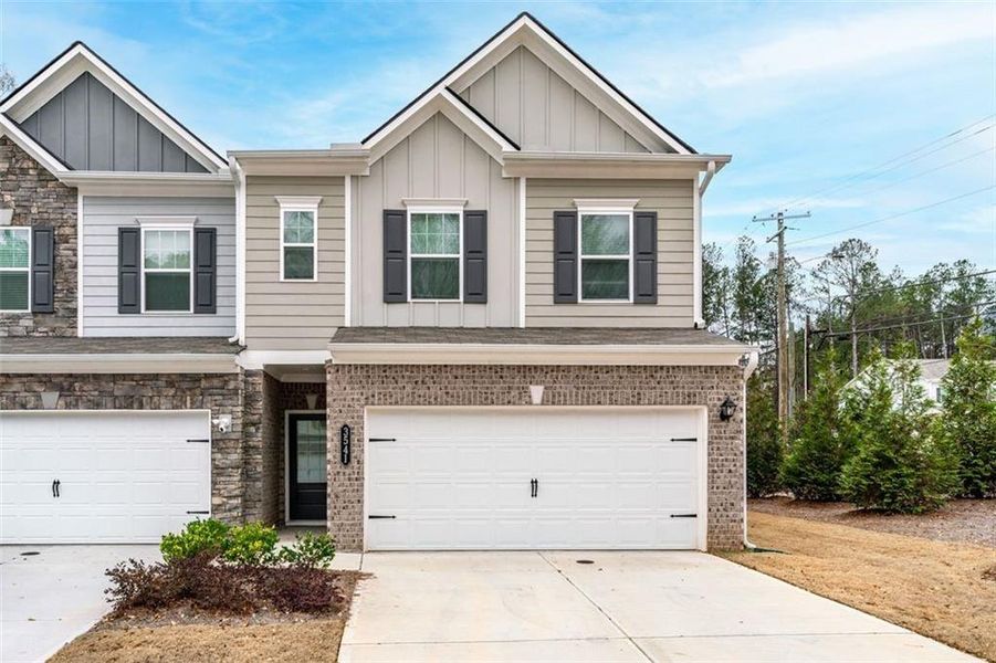 Front exterior of a new home in , Powder Springs, GA, highlighting curb appeal (Image 23).
