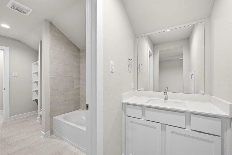 Furnished interior view inside a new home in Sunterra Lakes, Fulshear (Image 11). Furnished interior view inside a new home in Sunterra Lakes, Fulshear (Image 11).