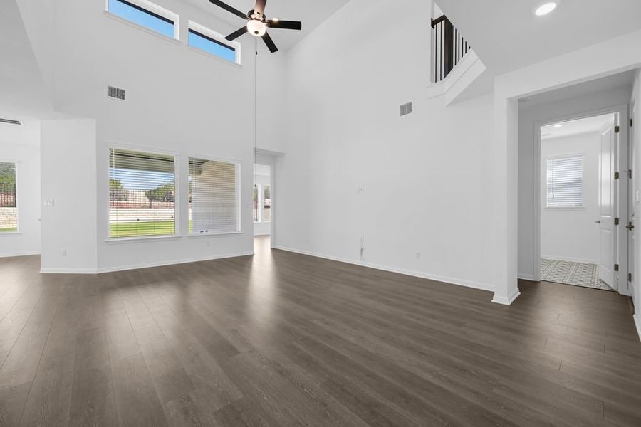 Spacious, unfurnished interior of a new home in Travisso Capri Collection, Leander (Image 11).