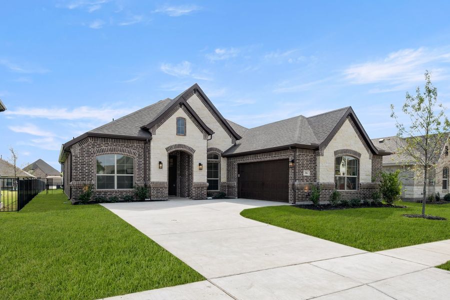 Front exterior of a new home in Abe's Landing, Granbury, TX, highlighting curb appeal (Image 21). Front exterior of a new home in Abe's Landing, Granbury, TX, highlighting curb appeal (Image 21).