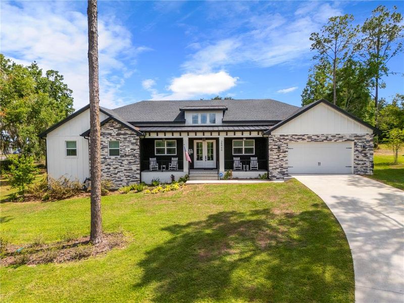 Front exterior of a new home in , Dade City, FL, highlighting curb appeal (Image 22).