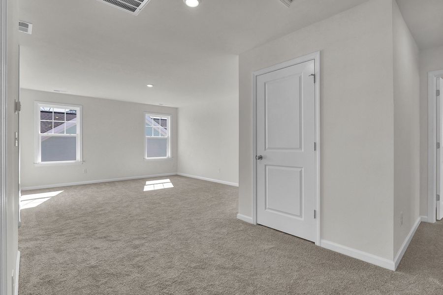 Spacious, unfurnished interior of a new home in Grand Park, Leland (Image 30).