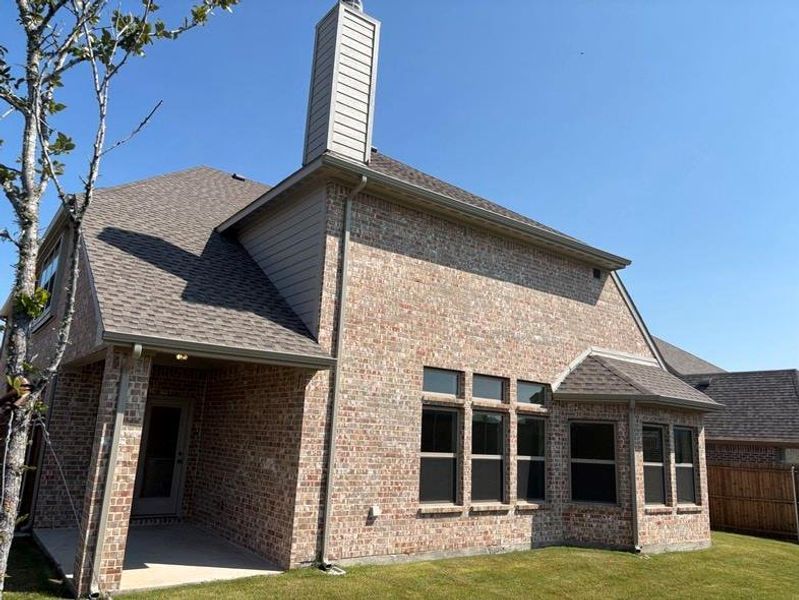 Front exterior of a new home in DeBerry Heritage, Josephine, TX, highlighting curb appeal (Image 18). Front exterior of a new home in DeBerry Heritage, Josephine, TX, highlighting curb appeal (Image 18).