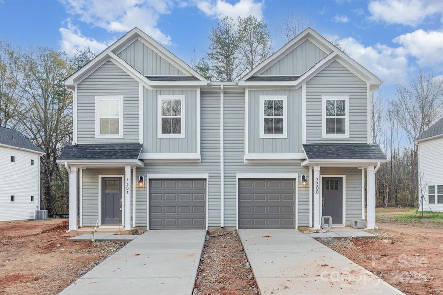 Front exterior of a new home in , Charlotte, NC, highlighting curb appeal (Image 2).