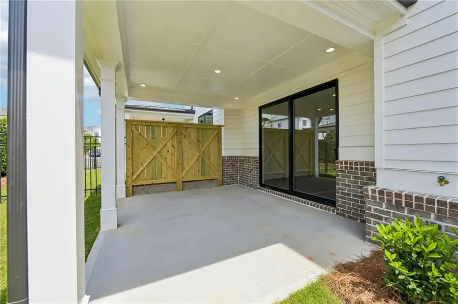 Exterior details and patio area of a home in , Buford (Image 27).