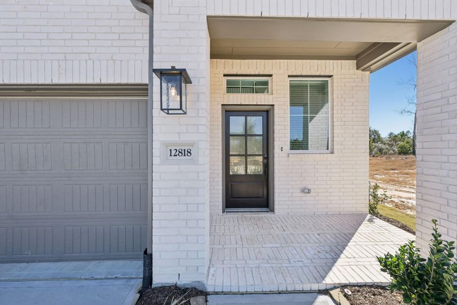 Exterior details and patio area of a home in Evergreen, Conroe (Image 22).