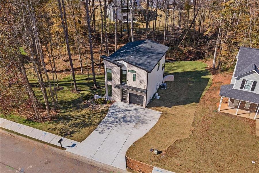 Front exterior of a new home in , Villa Rica, GA, highlighting curb appeal (Image 28).