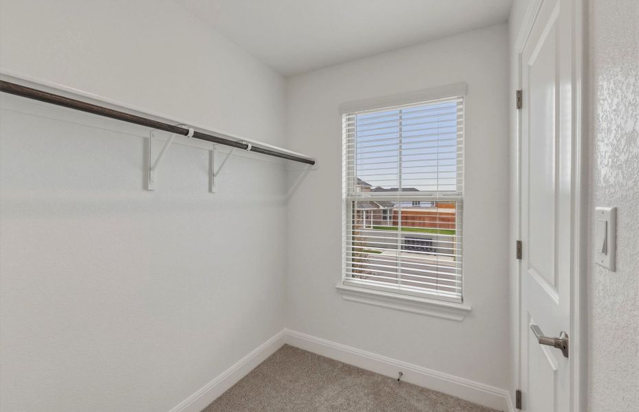 Spacious, unfurnished interior of a new home in Saddleback at Santa Rita Ranch, Liberty Hill (Image 52).