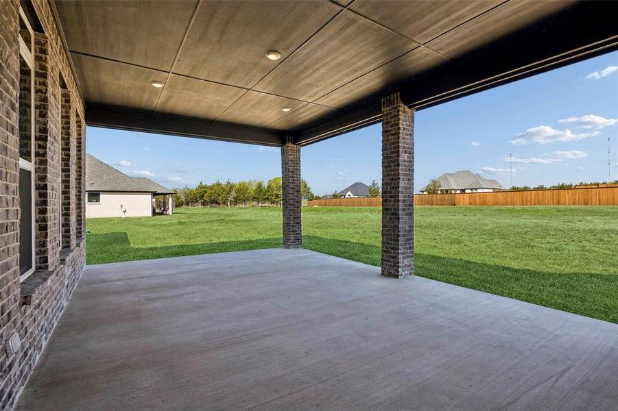 Exterior details and patio area of a home in The Arbors Midlothian, Midlothian (Image 4).
