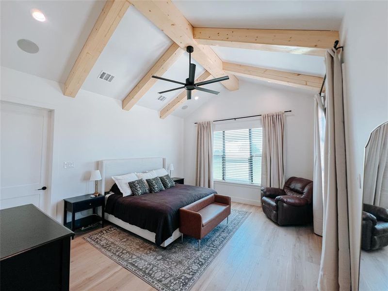 Bedroom featuring light wood-type flooring and ceiling fan