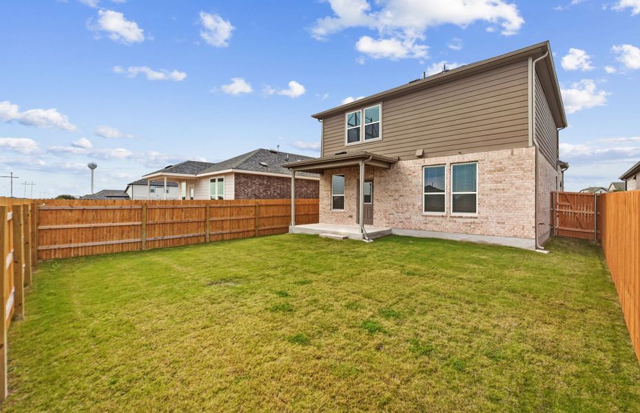 Exterior details and patio area of a home in Crosswinds, Kyle (Image 4).