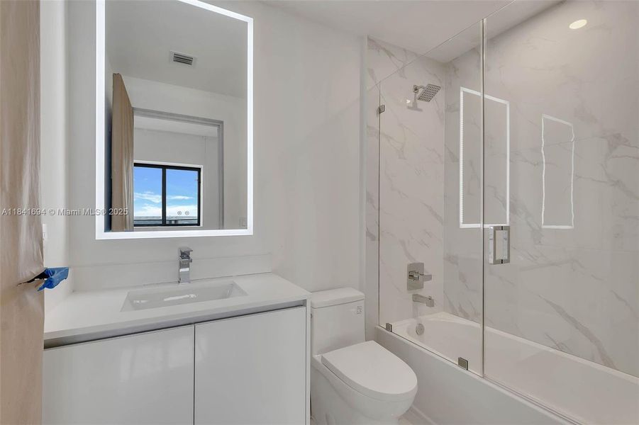 Furnished interior view inside a new home in Aria Reserve, Miami (Image 11).