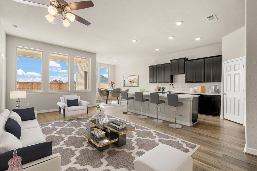 Open concept living space.  Note: Sample product photo - actual exterior and interior selections may vary by homesite