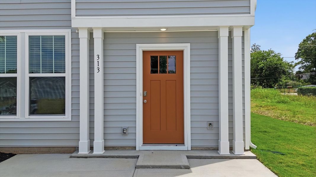 Eye-catching exterior with timeless color palette and superior architectural detail at the Clarke Townes community