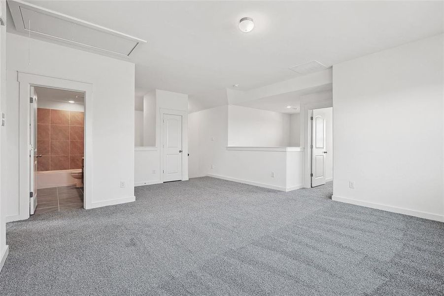 Empty room featuring carpet floors