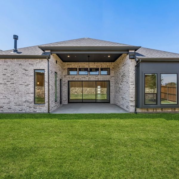 Exterior details and patio area of a home in StarView, Prosper (Image 27). Exterior details and patio area of a home in StarView, Prosper (Image 27).