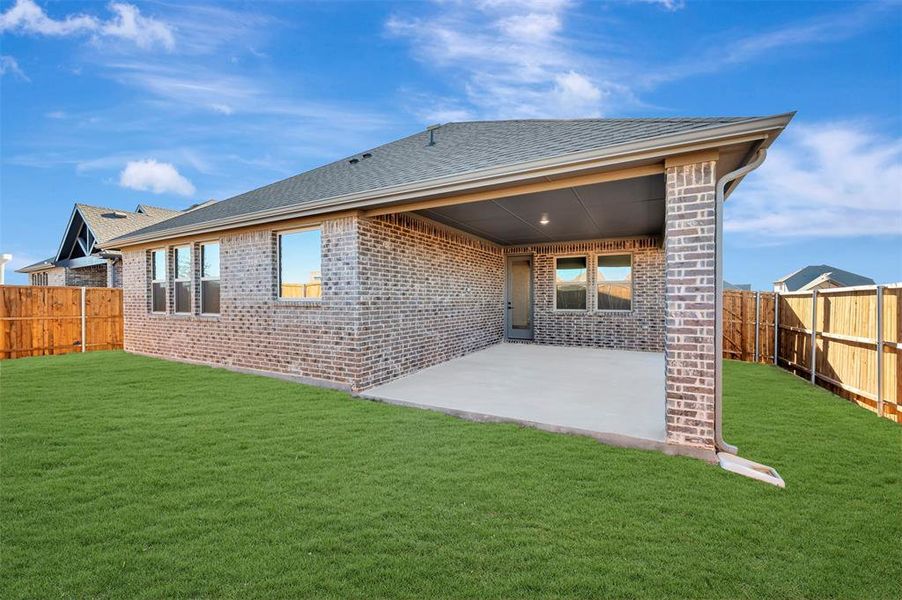 Exterior details and patio area of a home in Timberbrook, Justin (Image 20).