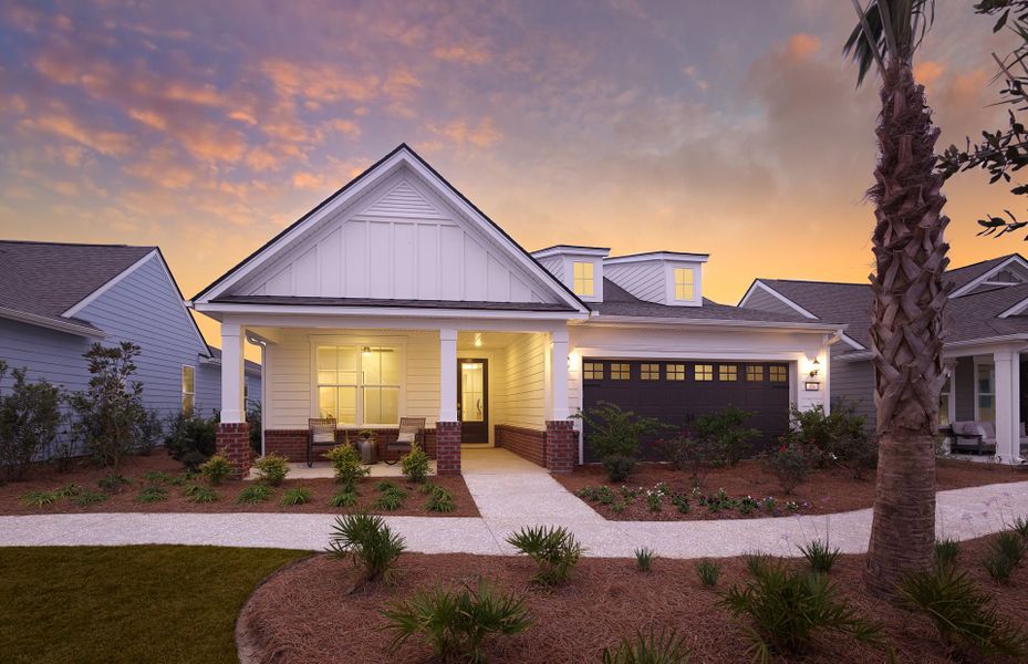 Front exterior of a new home in Midpoint at New Riverside, Bluffton, SC, highlighting curb appeal (Image 2). Front exterior of a new home in Midpoint at New Riverside, Bluffton, SC, highlighting curb appeal (Image 2).
