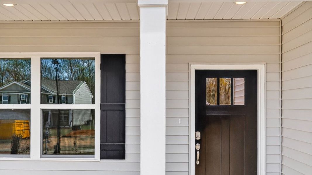 Exterior details and patio area of a home in Swift Creek Farm, Clayton (Image 3). Exterior details and patio area of a home in Swift Creek Farm, Clayton (Image 3).