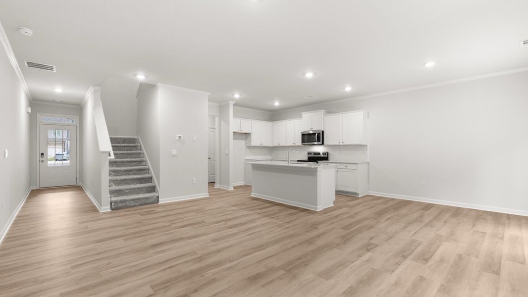 Representative unfurnished interior of a home built from the Salisbury by D.R. Horton in Waypoint, Flowery Branch (Image 16).