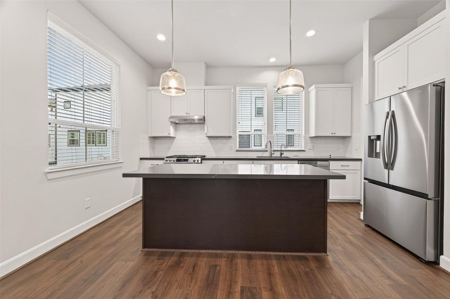 Furnished interior view inside a new home in The Corner At Buffalo Pointe, Houston (Image 8).