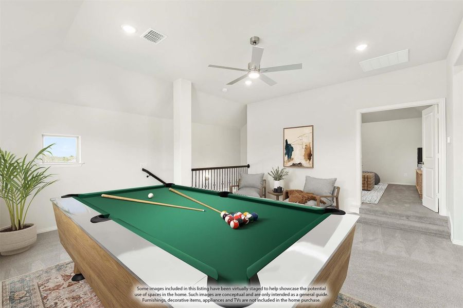 Game room with pool table, ceiling fan, and open seating area on upper floor