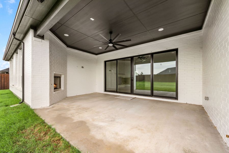Exterior details and patio area of a home in NorthGlen, Haslet (Image 23).