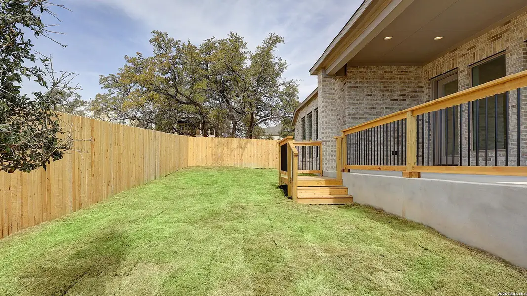 Exterior details and patio area of a home in The Ranches at Creekside, Boerne (Image 3).