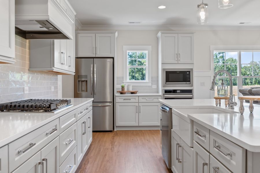 Representative furnished interior of a home built from the Scout by Bill Clark Homes in Riverside Cove, Wilmington (Image 11).