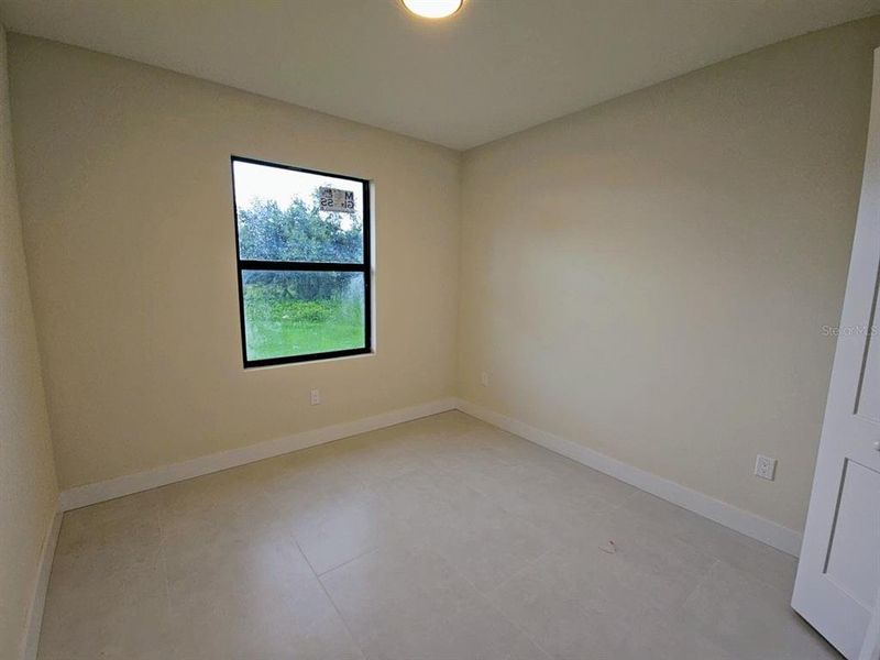 Spacious, unfurnished interior of a new home in , Port Charlotte (Image 23).
