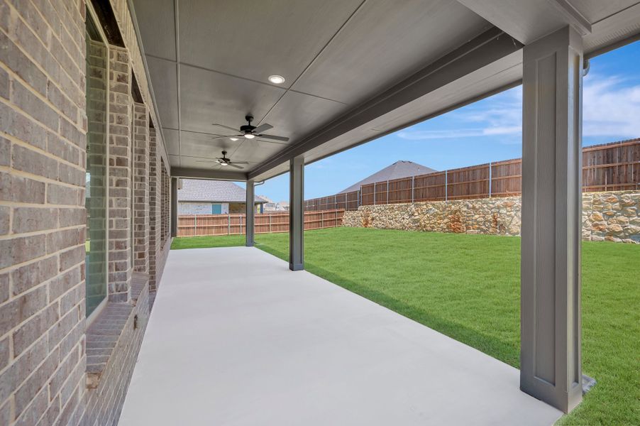 Exterior details and patio area of a home in View at the Reserve, Mansfield (Image 19).