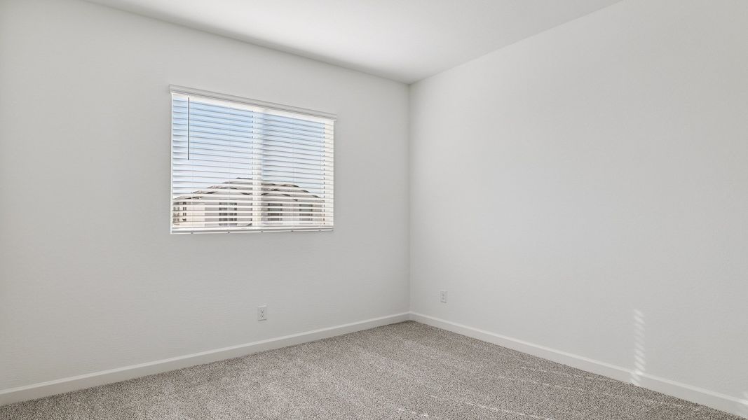 Spacious, unfurnished interior of a new home in Apache Farms, Buckeye (Image 31).