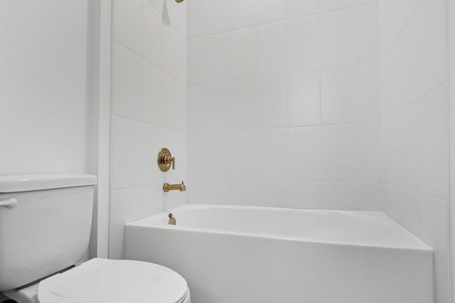 Representative furnished interior of a home built from the Barbados by Taylor Morrison in Ardisia Park, New Smyrna Beach (Image 14).