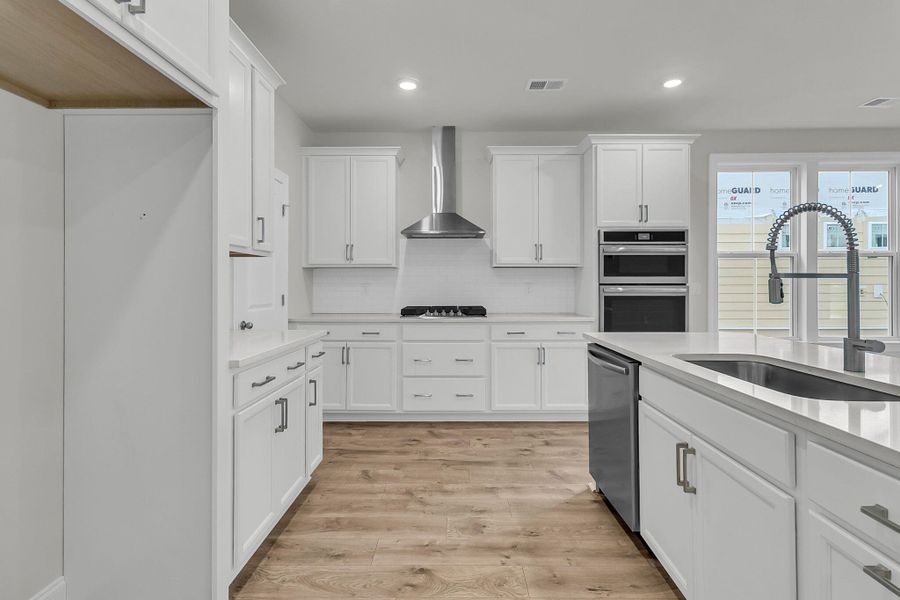 Furnished interior view inside a new home in Tidewater at Lakes of Cane Bay, Summerville (Image 9).