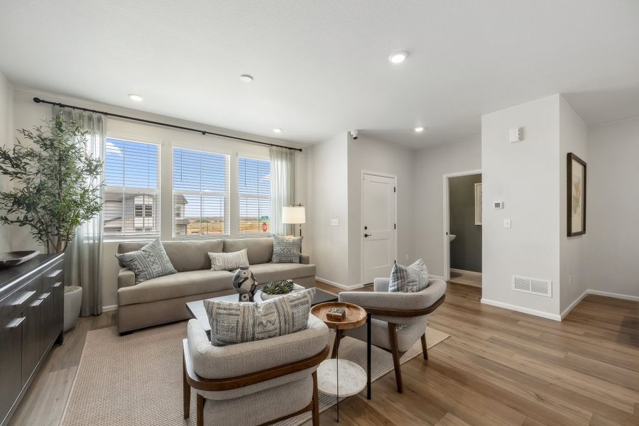 Representative furnished interior of a home built from the 2503 by Risewell Homes in Harvest Crossing, Aurora (Image 6).