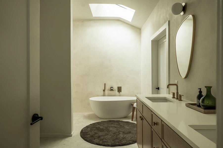 Boho chic style bathroom with waterproof lime plaster finish.